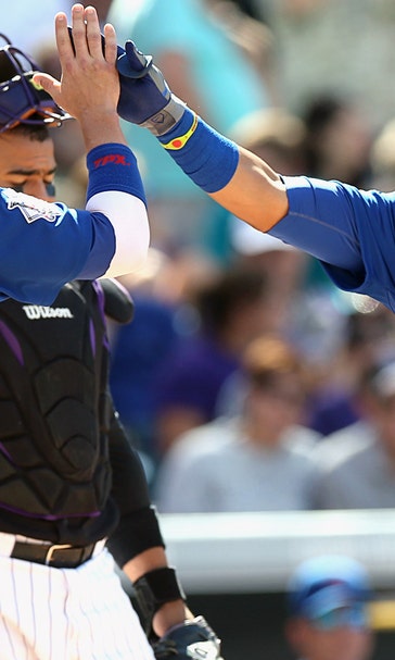 Rookie Baez hits 2 homers, drives in 4 as Cubs beat Rockies